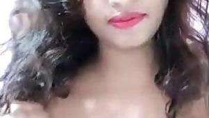 Green eyed Desi with pink lips boasts about treasures called tits