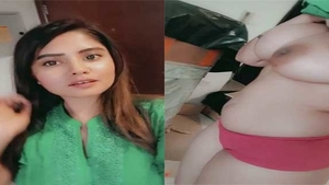 Pakistani babe entertains her lover with a sensual striptease