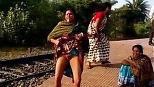 Milf aunty stripping and show her pussy in the middle of the railway station
