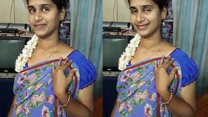 Sensual Tamil homemaker reveals navel in arousing display