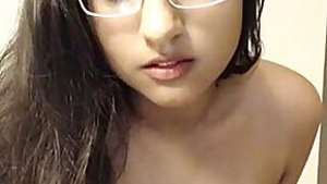 Indian wife plays with glasses adores nothing better than porn posing on webcam