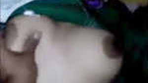 A South Asian girl with large breasts behaves inappropriately while being filmed