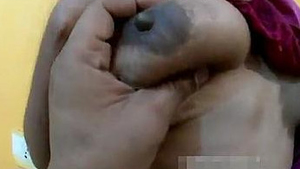 Horny Telugu wife Radha's self-pleasure and boobs