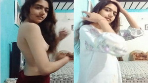 Exclusive video of a cute Indian girl flaunting her breasts in a seductive manner