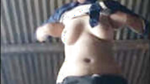 Village cam girl lifts her Top Boobs show