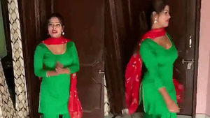 Curvy woman performs sensual dance in traditional Indian attire