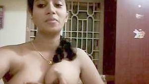 Village girl with a pretty face reveals her breasts