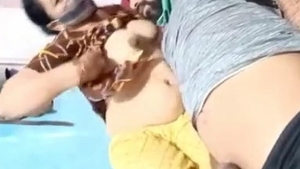 A South Asian maid provides oral and lactating services to her employer