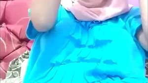 A Muslim college woman wearing a hijab misbehaves