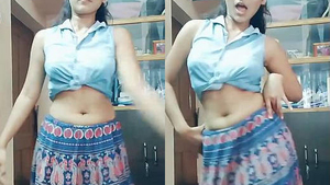 Indian girl seductively moves in a dance video