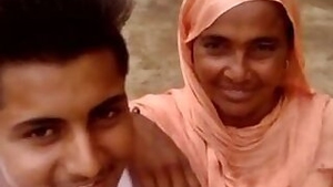 Boy and Desi MILF smile on camera thinking about upcoming porn music video